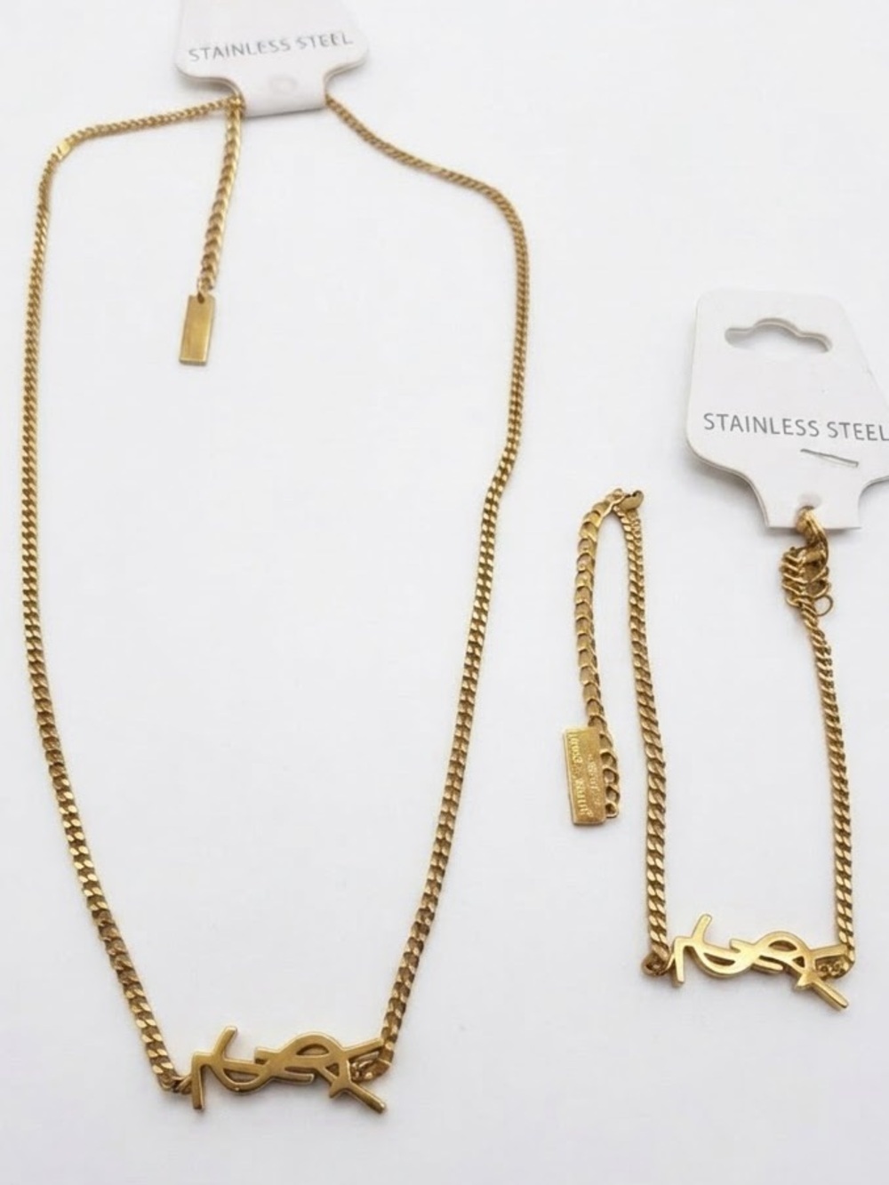 MUST HAVE ..Gold Tone Lettered Necklace and Bracelet Set